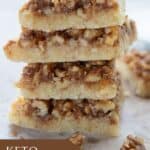 Close up shot of a stack of Keto Baklava Bars on a rustic tabletop.