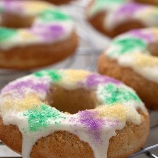 Close up shot of a keto king cake donut on a cooling rack