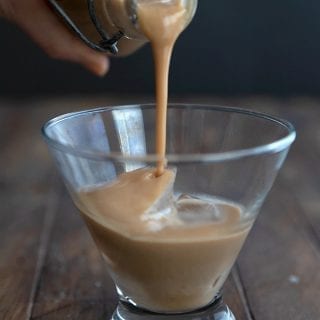 Close up shot of keto Irish Cream being poured into a glass.