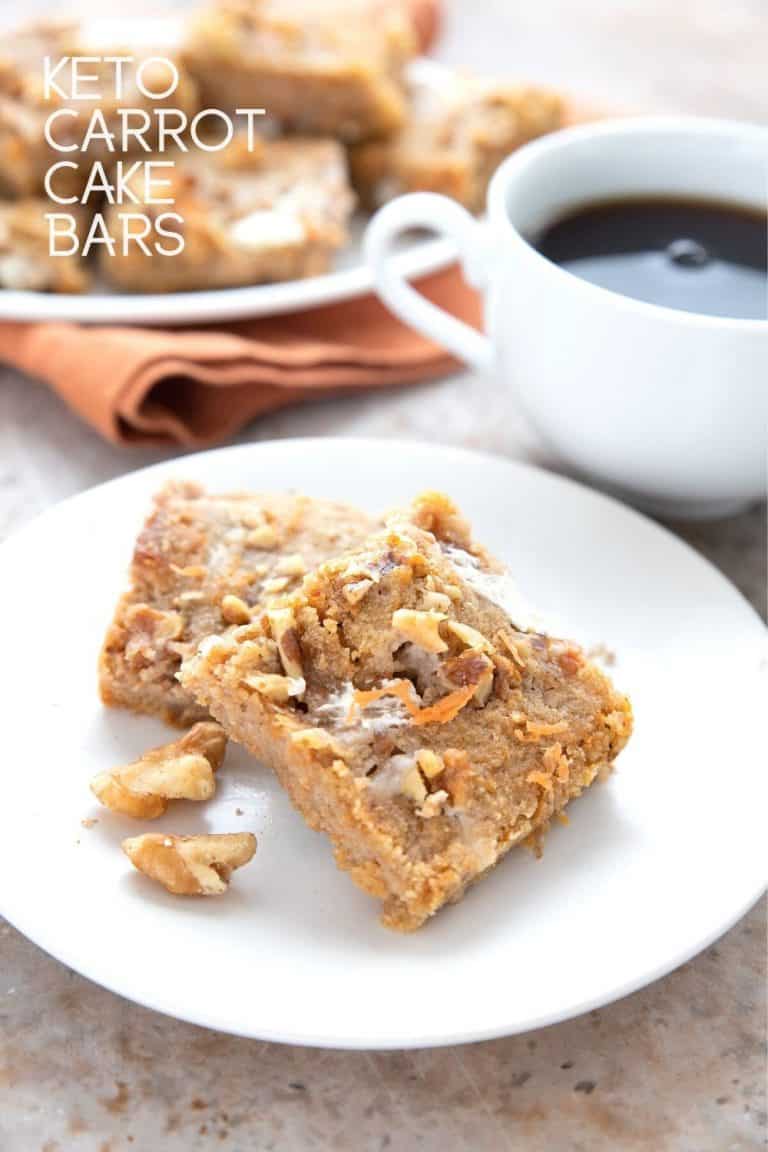 Titled image of two keto carrot cake bars on a white plate with a cup of coffee in the background.