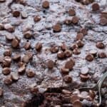 Titled image of a spoon digging into a pan of Keto Chocolate Dump Cake.