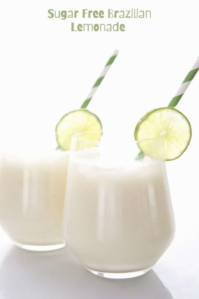 Titled image: Two glasses of Brazilian Lemonade with lime slice garnish and green striped straws on a white background.