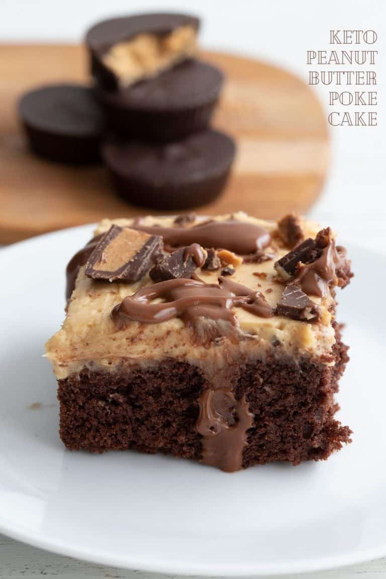 Titled image of keto chocolate peanut butter poke cake on a white plate, with keto peanut butter cups in the background.