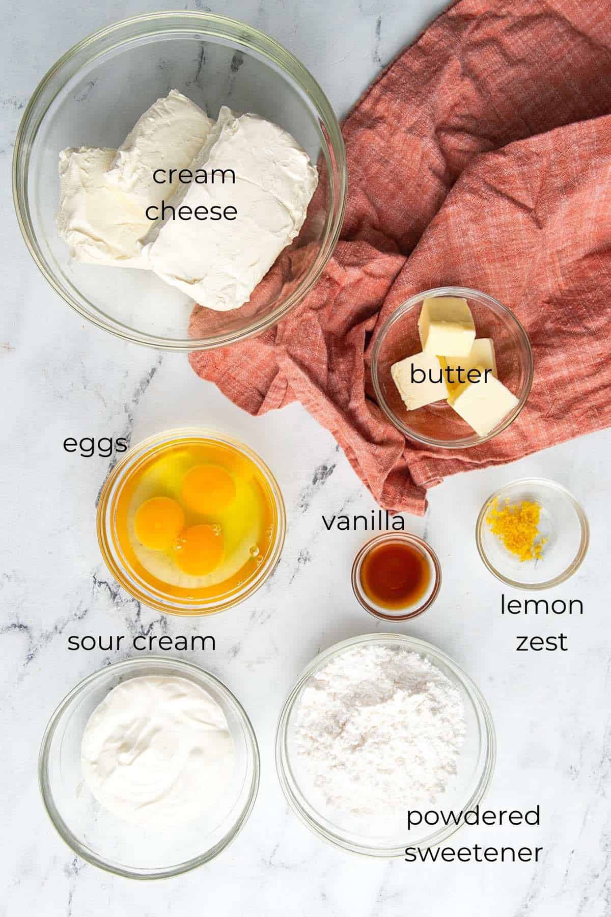 Top down image of the ingredients required for making keto cheesecake. 