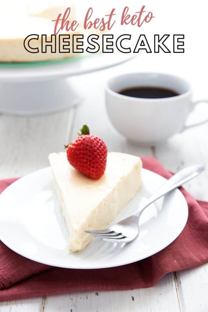 Titled image of the best keto cheesecake on a white plate over a red napkin with a cup of coffee in the background.
