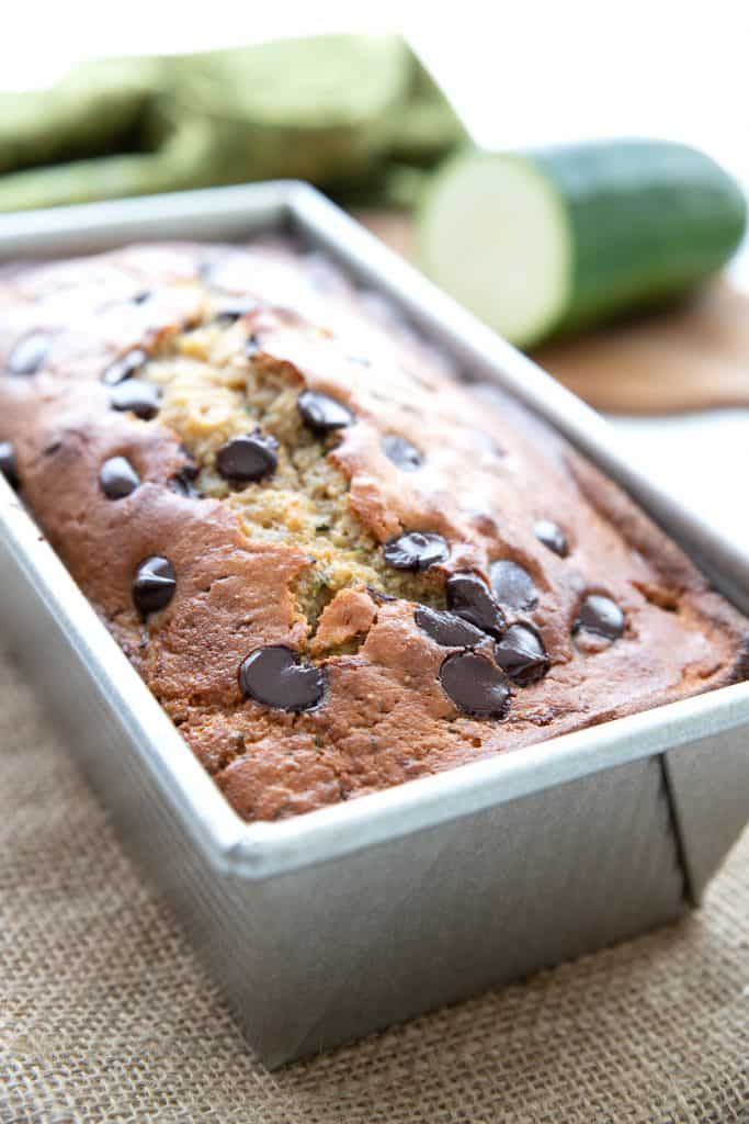 Close up shot of keto chocolate chip zucchini bread in a loaf pan.