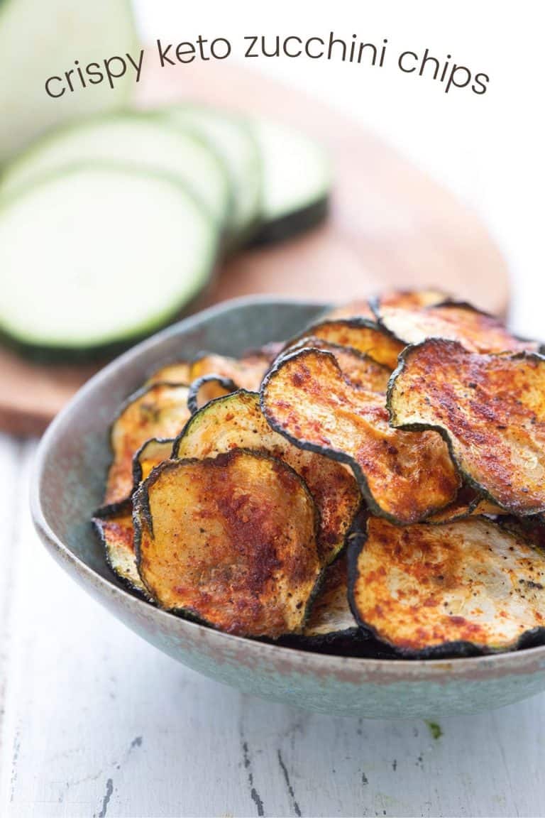 Titled image of a bowl of crispy zucchini chips with smoked paprika.