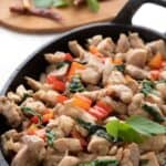 Titled Pinterest image for Keto Thai Basil Chicken.