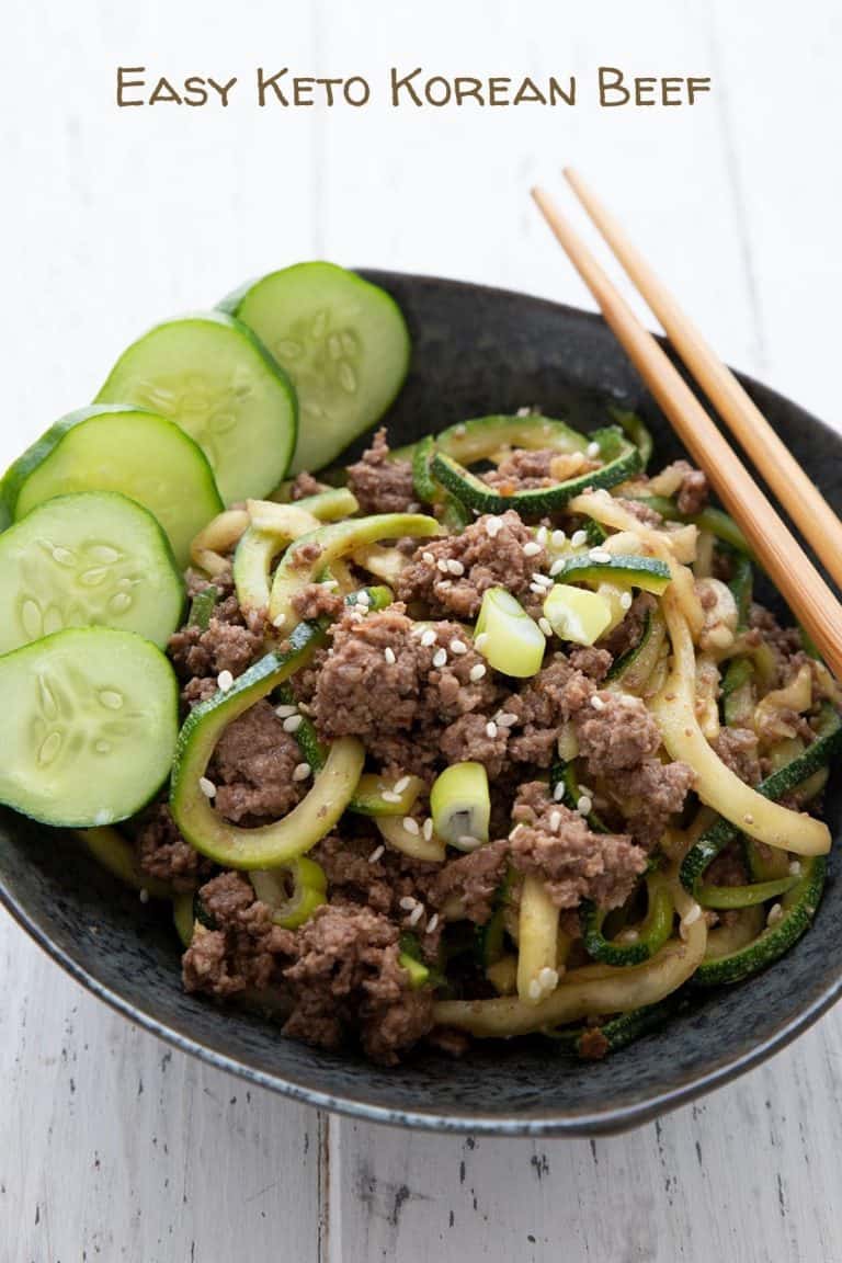 Titled image of a bowl of keto Korean beef with zucchini noodles and chopsticks on the side.