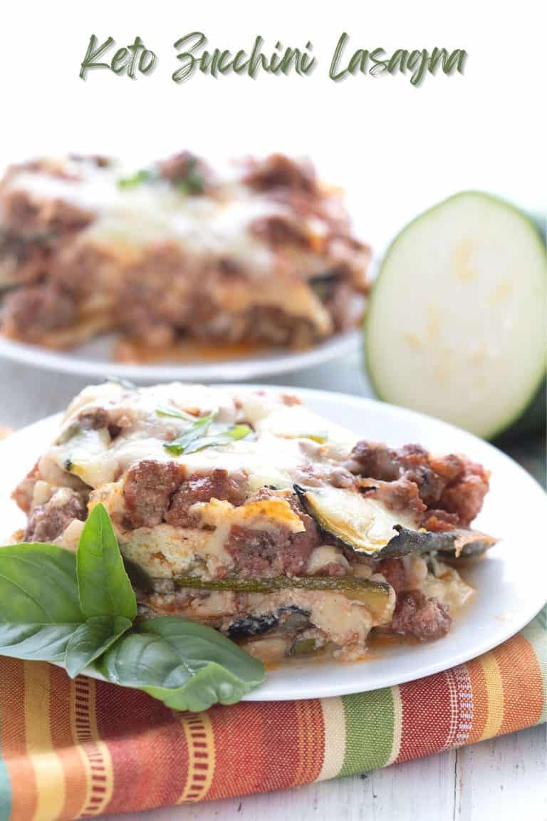 Titled image of a piece of grilled zucchini lasagna on a white plate over a colorful striped napkin.