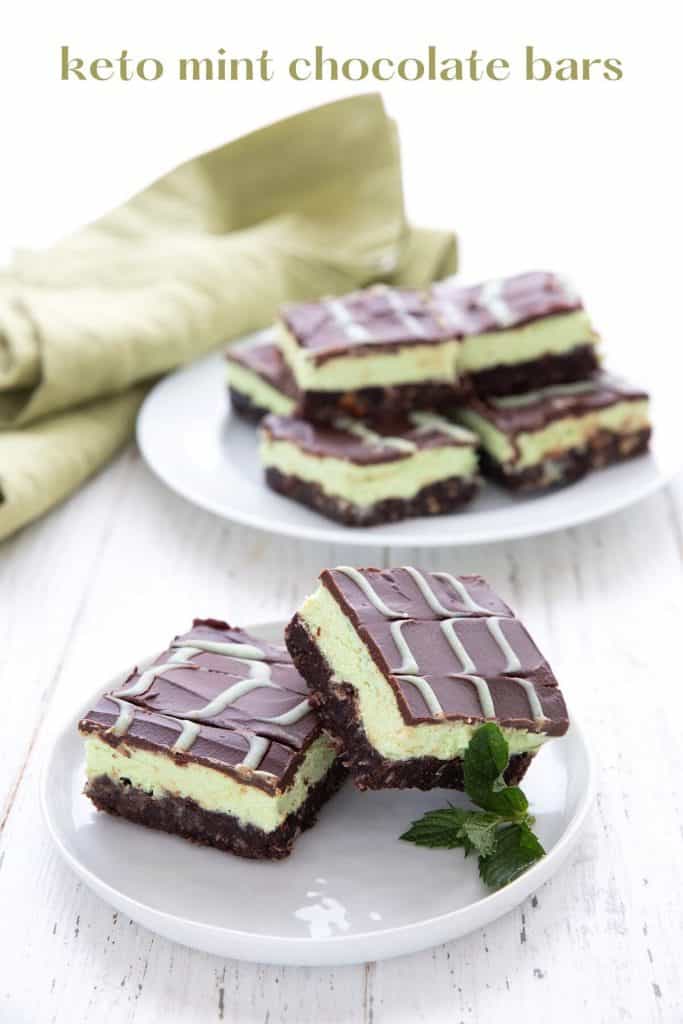 Titled image of keto mint chocolate bars on a white plate with a platter of more bars in the background.