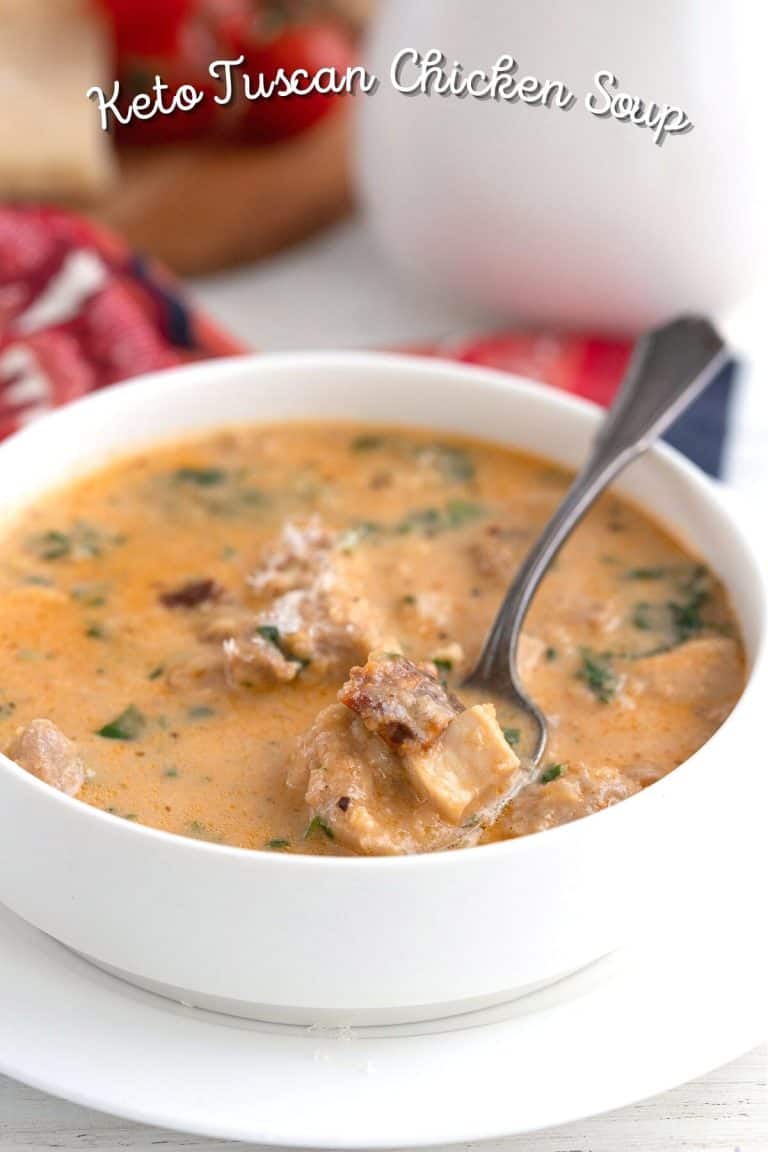 Titled image of a bowl of Keto Tuscan Chicken Soup with a spoon in it.