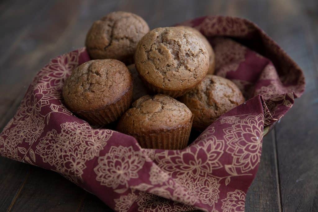A bowl filled with low carb gluten-free gingerbread muffins.