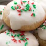 Titled image of a stack of keto ricotta cookies with holiday sprinkles on top.