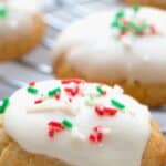 Titled image of keto ricotta cookies cooling on a wire baking rack.