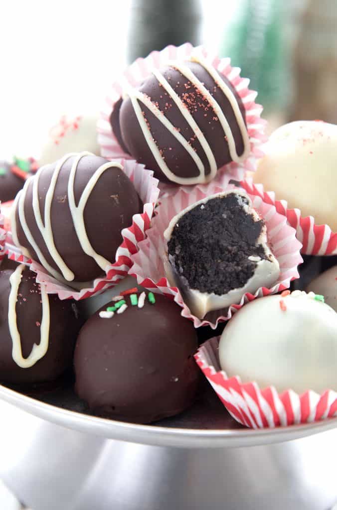 Close up shot of keto peppermint truffles with a bite taken out of one.