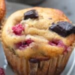 Close up image of a Keto Raspberry Chocolate Chunk Muffin with title.