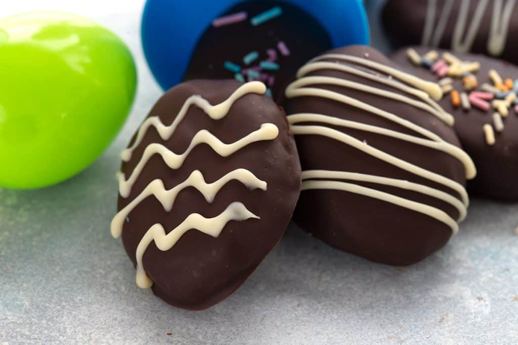 Close up shot of Keto Chocolate Covered Easter eggs with white chocolate drizzle