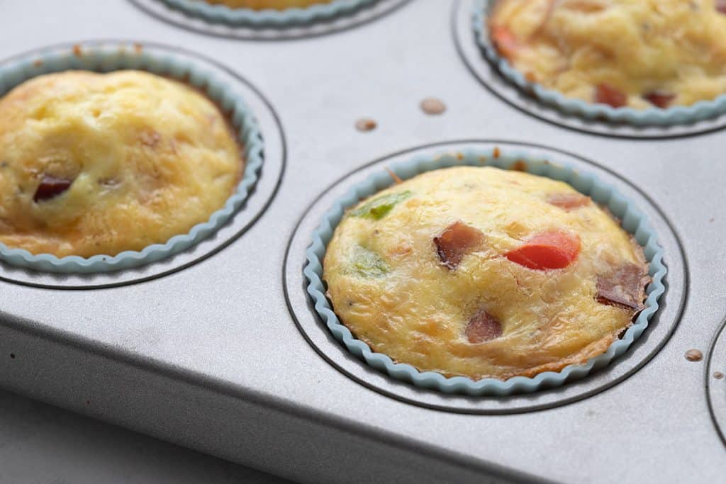 Close up shot of keto egg muffins in the baking pan.