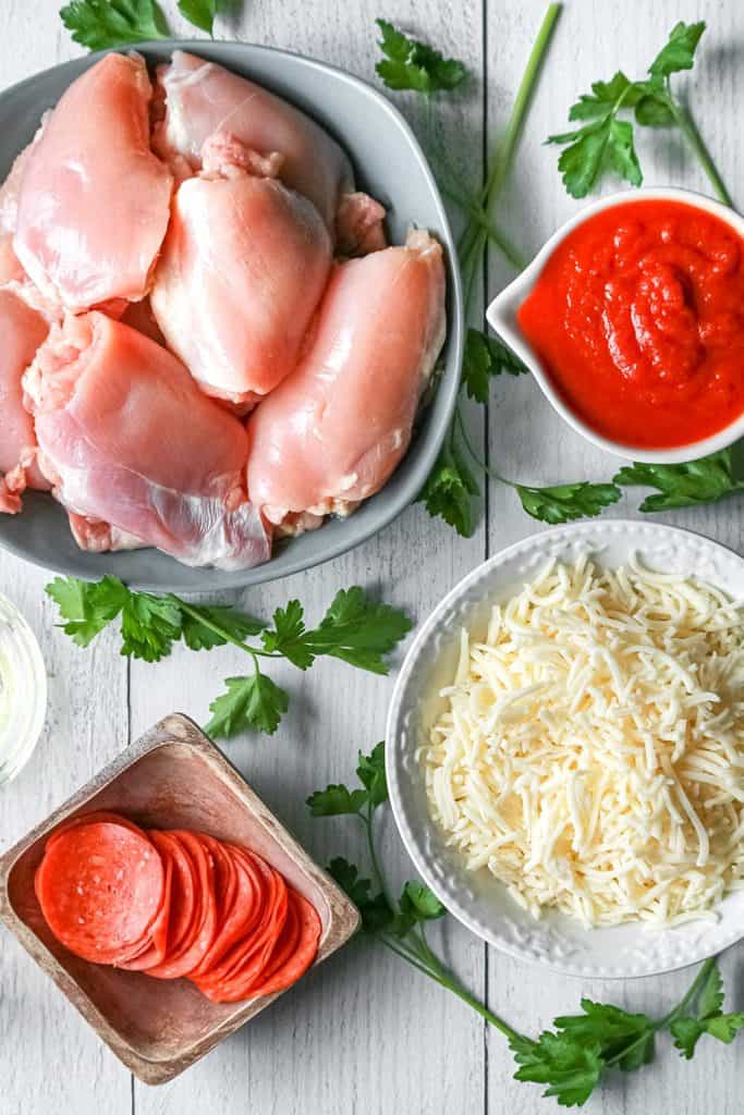 Top down image of the ingredients for easy pizza chicken.