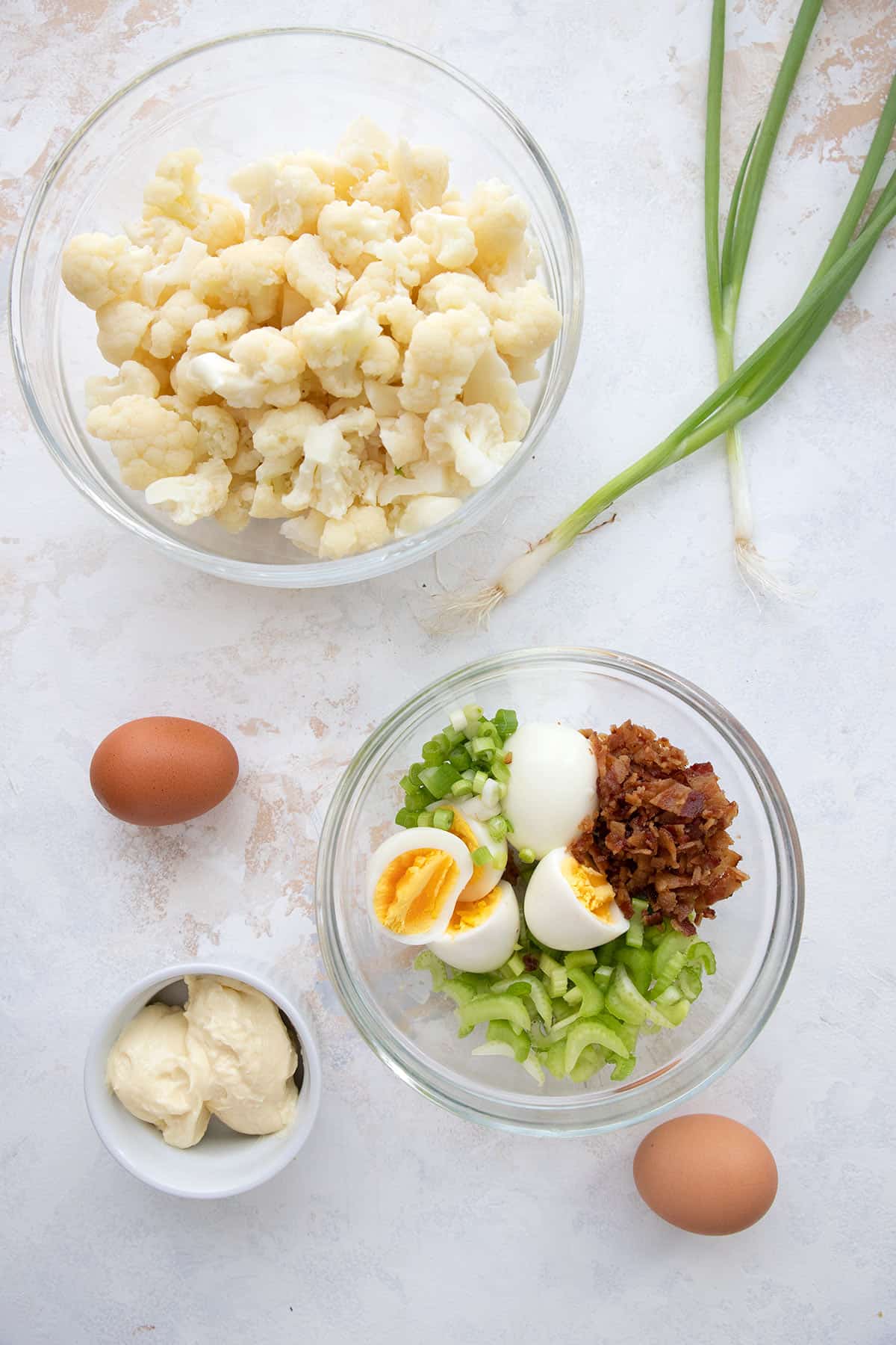 Top down image of the ingredients for keto cauliflower potato salad.