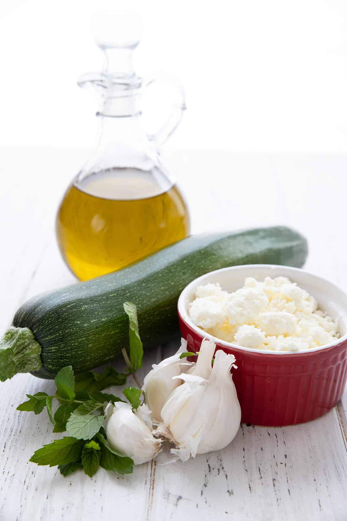 Ingredients for easy keto grilled zucchini with feta and mint.