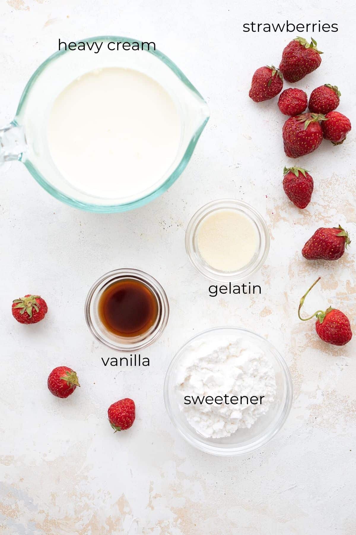 Top down image of the ingredients for keto strawberry panna cotta.