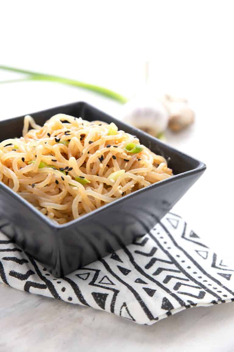 A black square dish filled with keto sesame noodles.