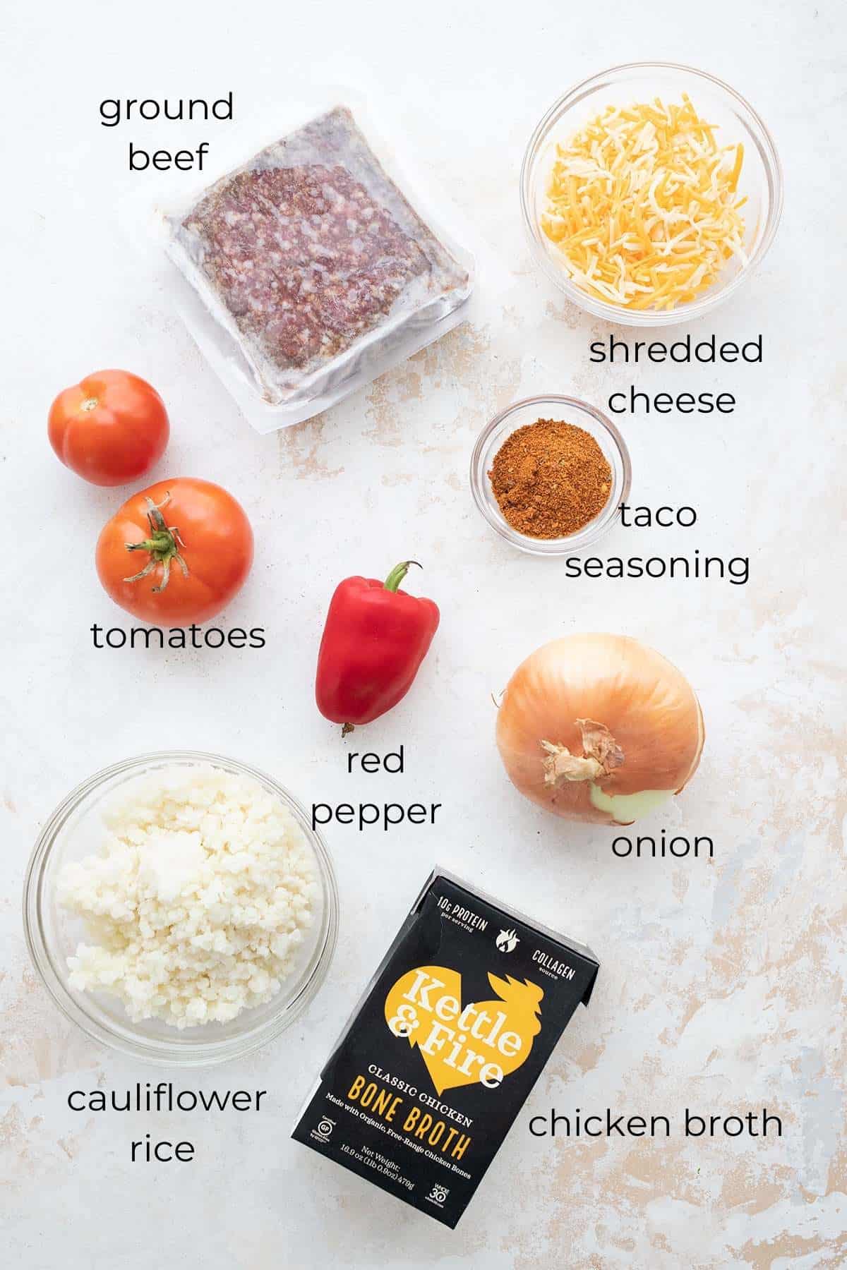 Top down image of the ingredients for Mexican Cauliflower Rice.