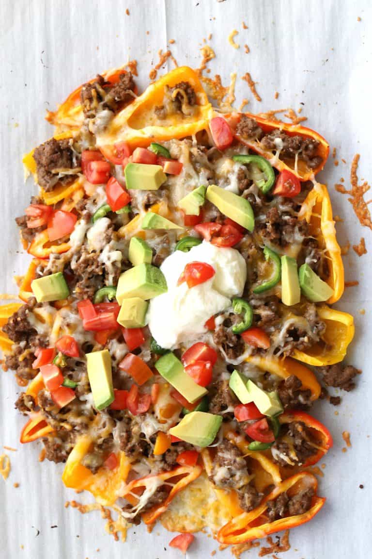 Top down image of keto nachos made with mini peppers.