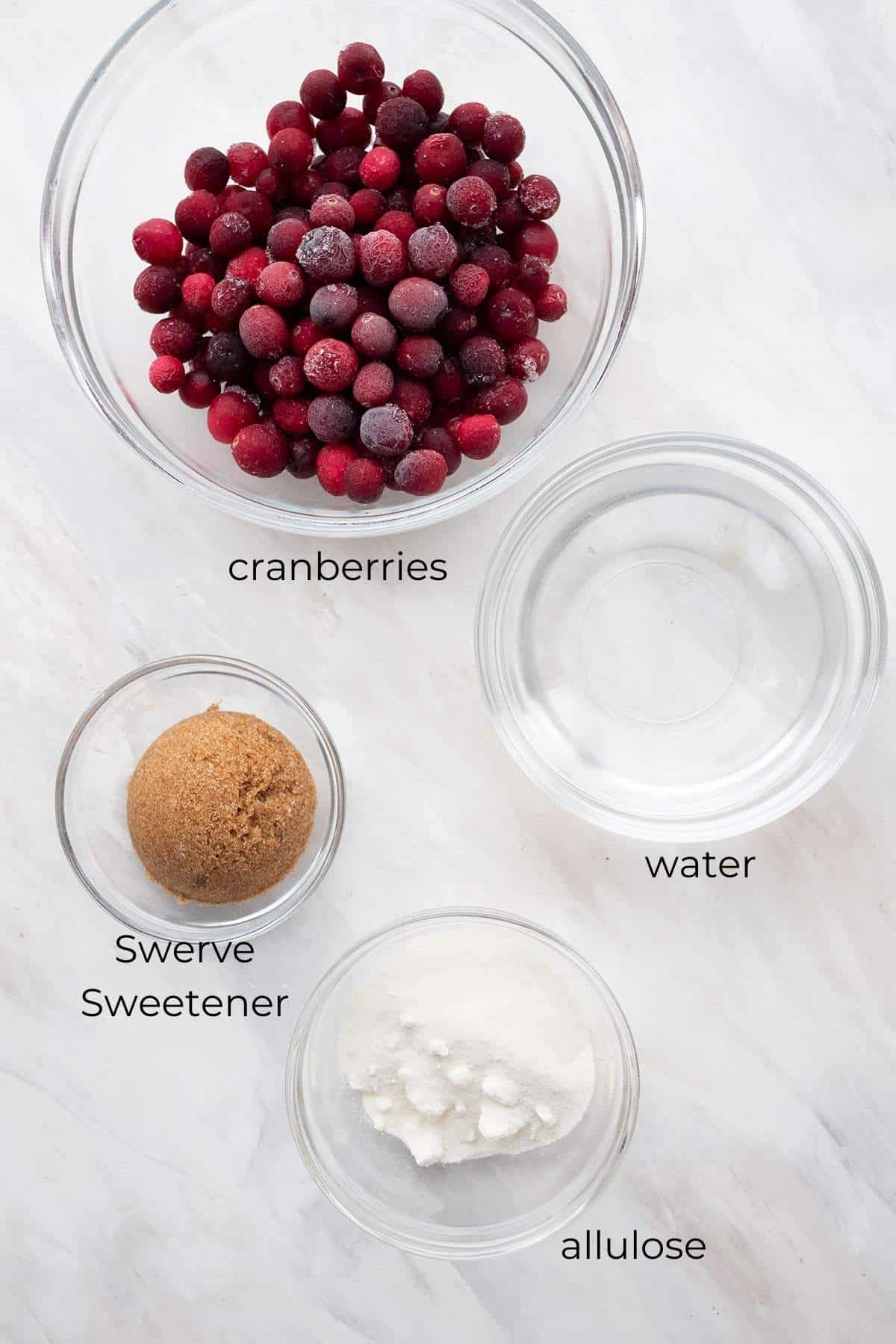 Top down image of ingredients needed for keto cranberry sauce.