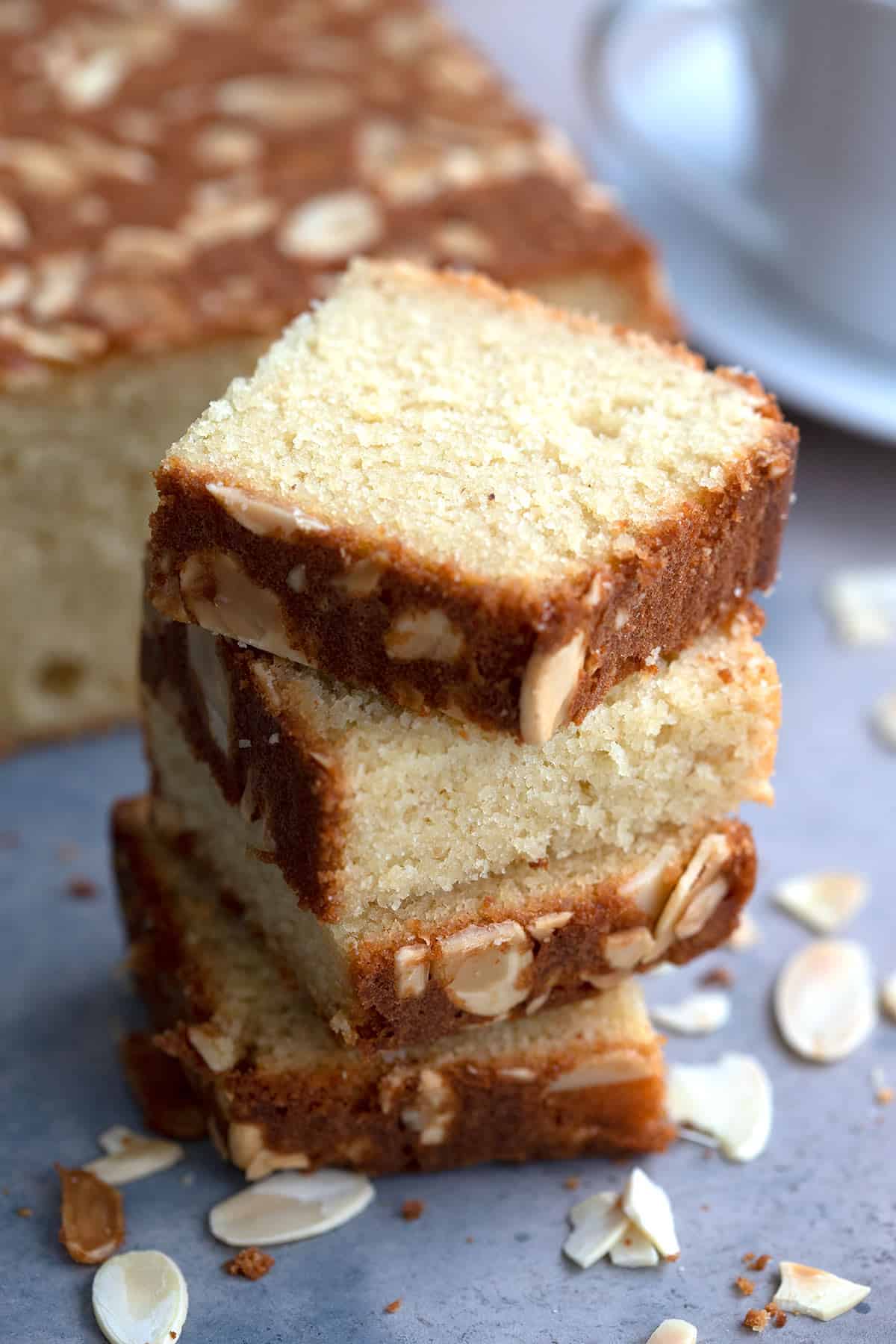 Close up shot of slices of almond flour cake stacked up.
