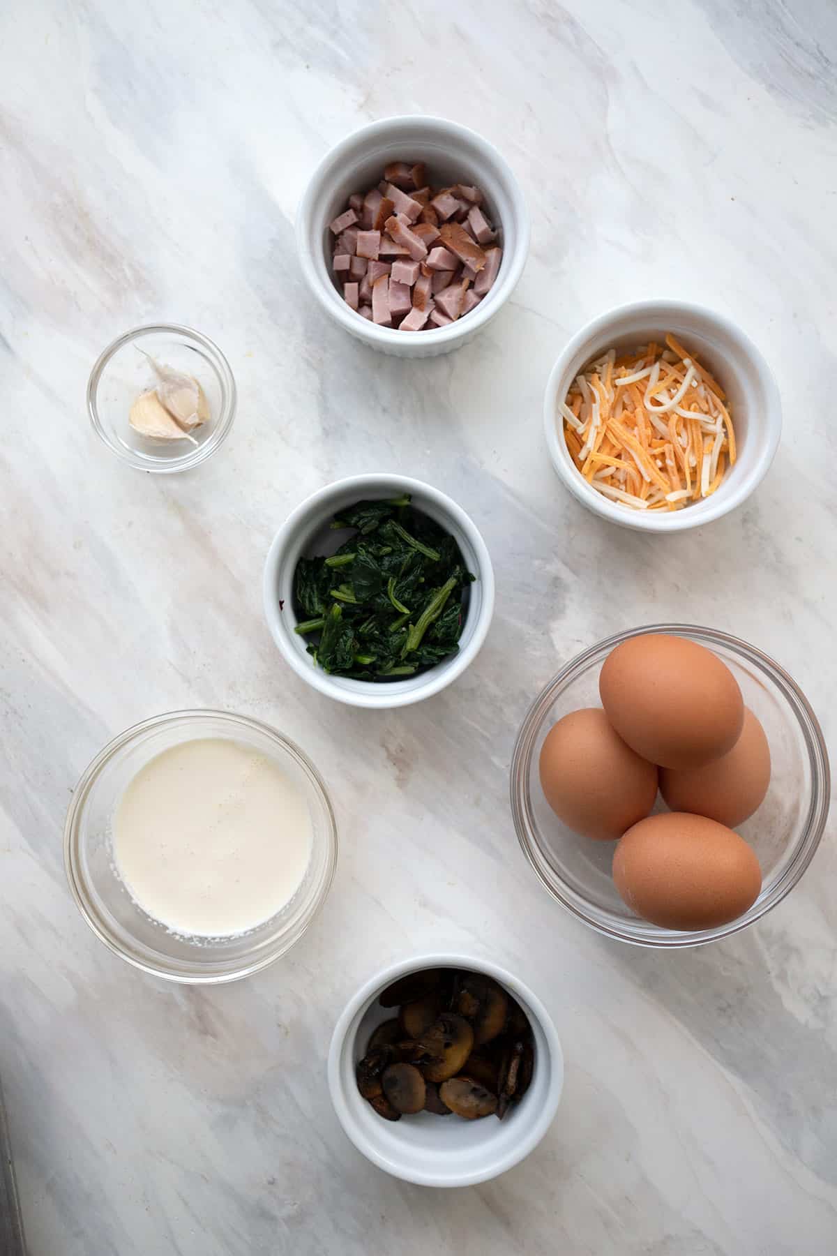 Top down image of the ingredients for keto mini quiches.