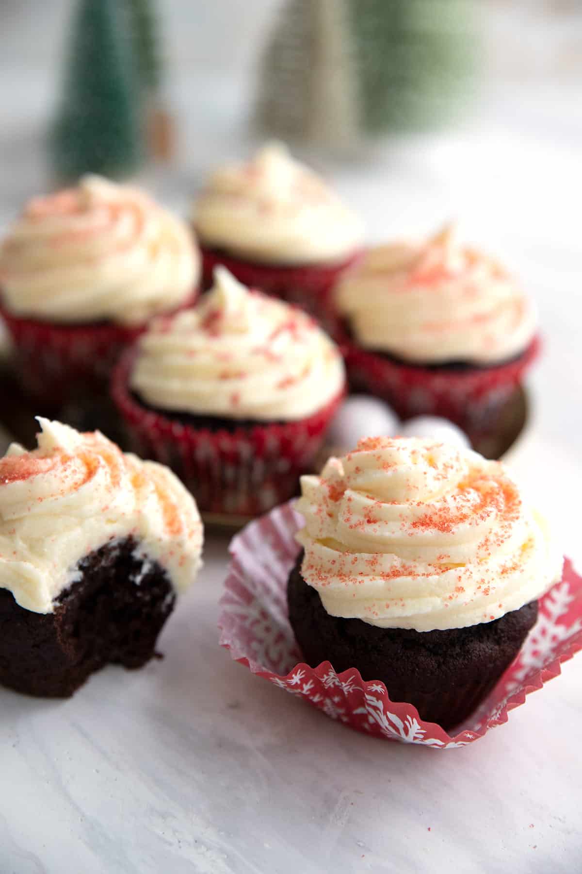 Keto Peppermint Cupcakes in red snowflake cupcake liners.