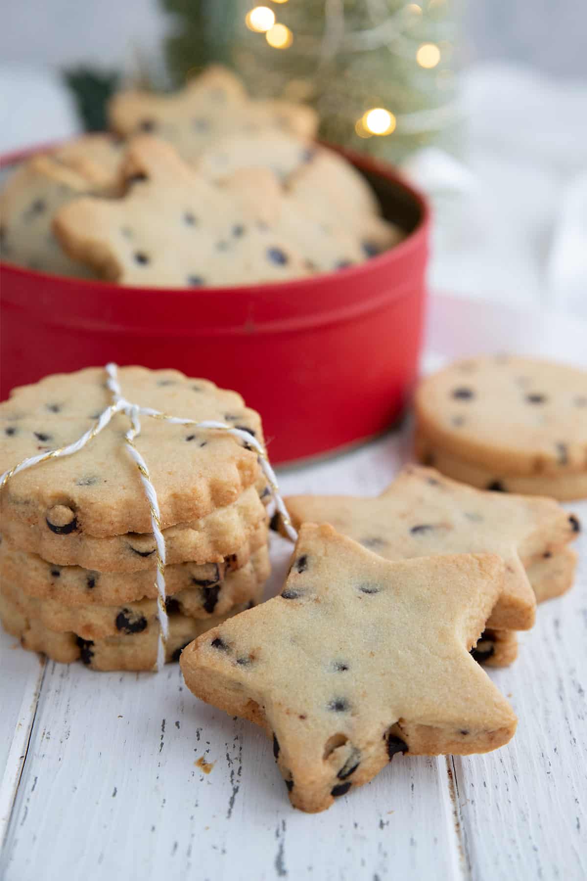 Keto Shortbread Cut Outs in the shape of stars and circles on a white table.