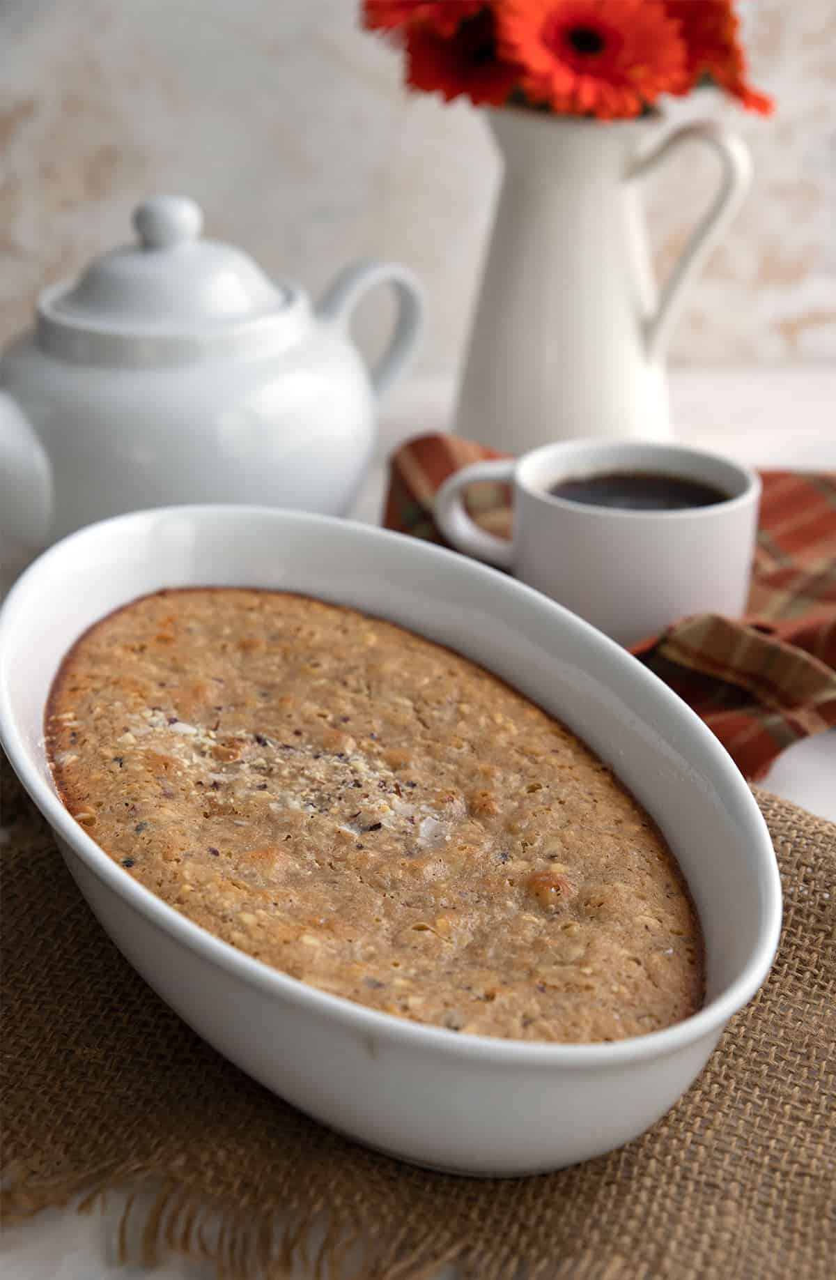 Keto oatmeal baked in a white oval dish.