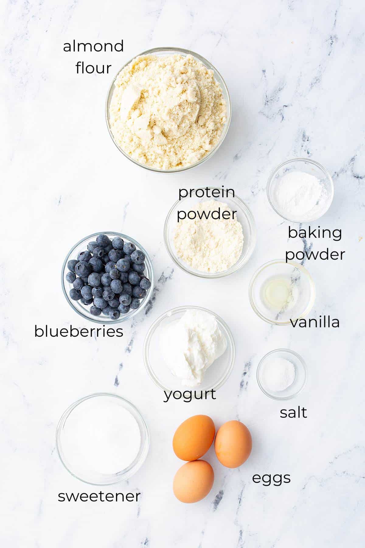 Top down image of the ingredients needed for Keto Blueberry Muffins.