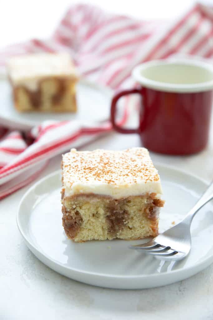 Keto Cinnamon Roll Poke Cake - All Day I Dream About Food