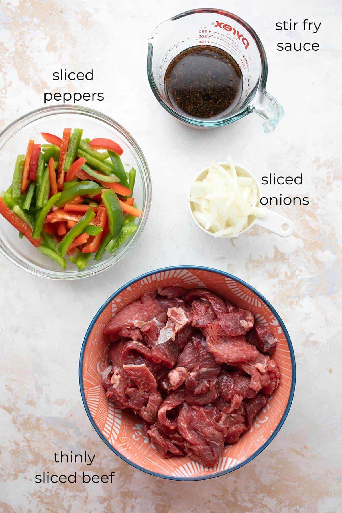 Top down image of ingredients for Keto Pepper Steak.
