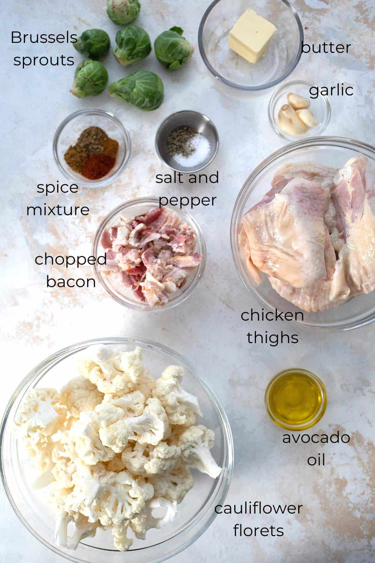 Top down image of ingredients for sheet pan chicken thighs.