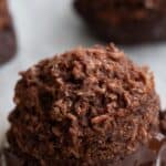 Titled Pinterest image of No Bake Keto Macaroons up close on a baking tray.