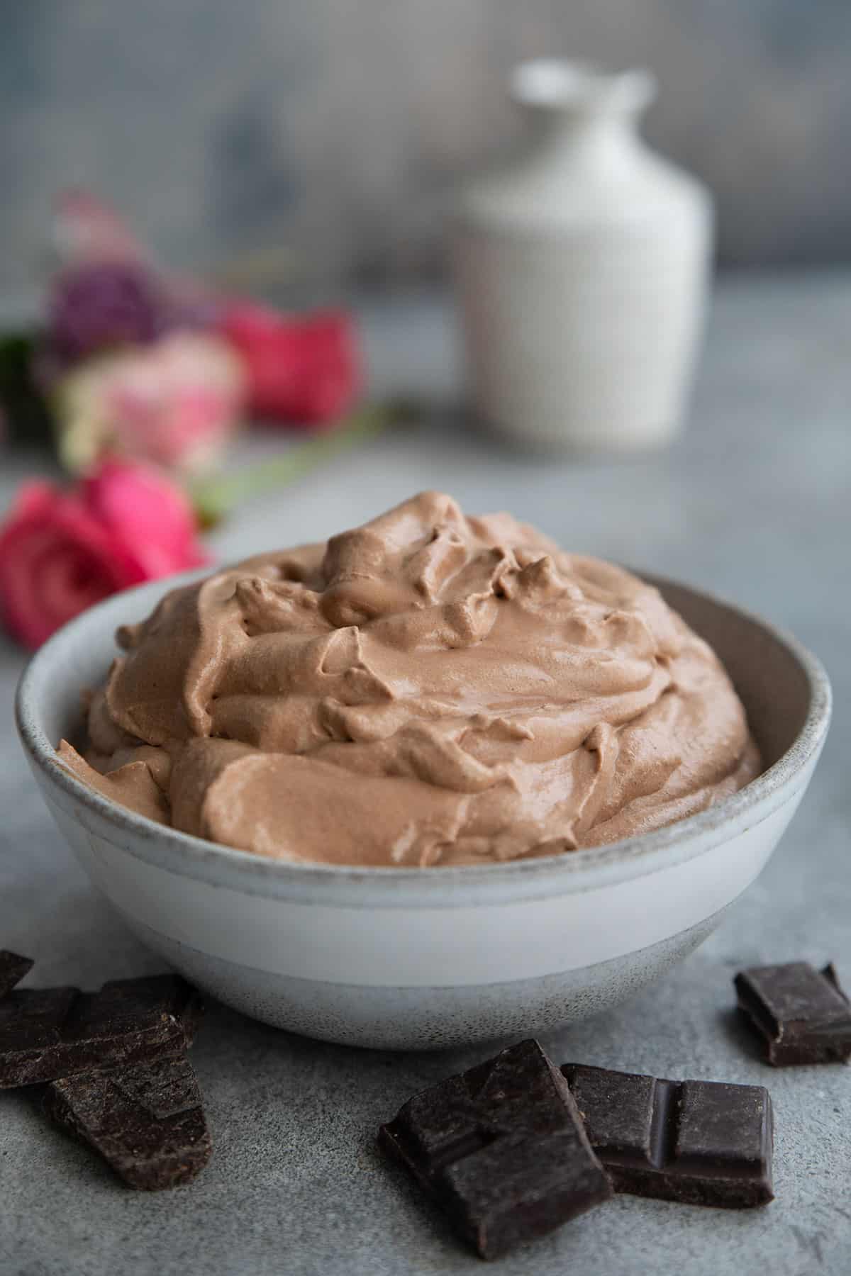 A large gray stoneware bowl filled with classic French-style keto chocolate mousse.