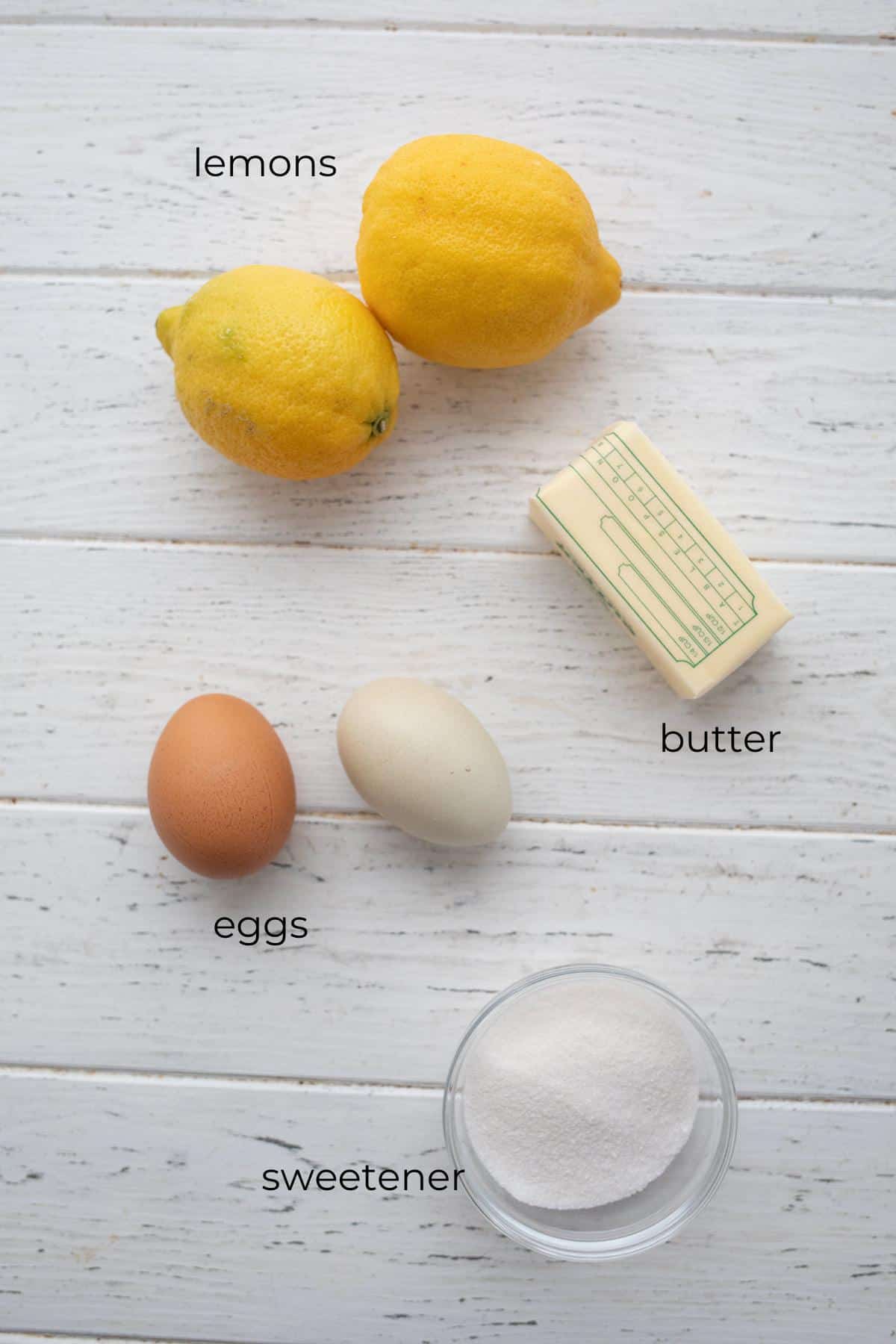 Top down image of ingredients needed for sugar-free lemon curd.