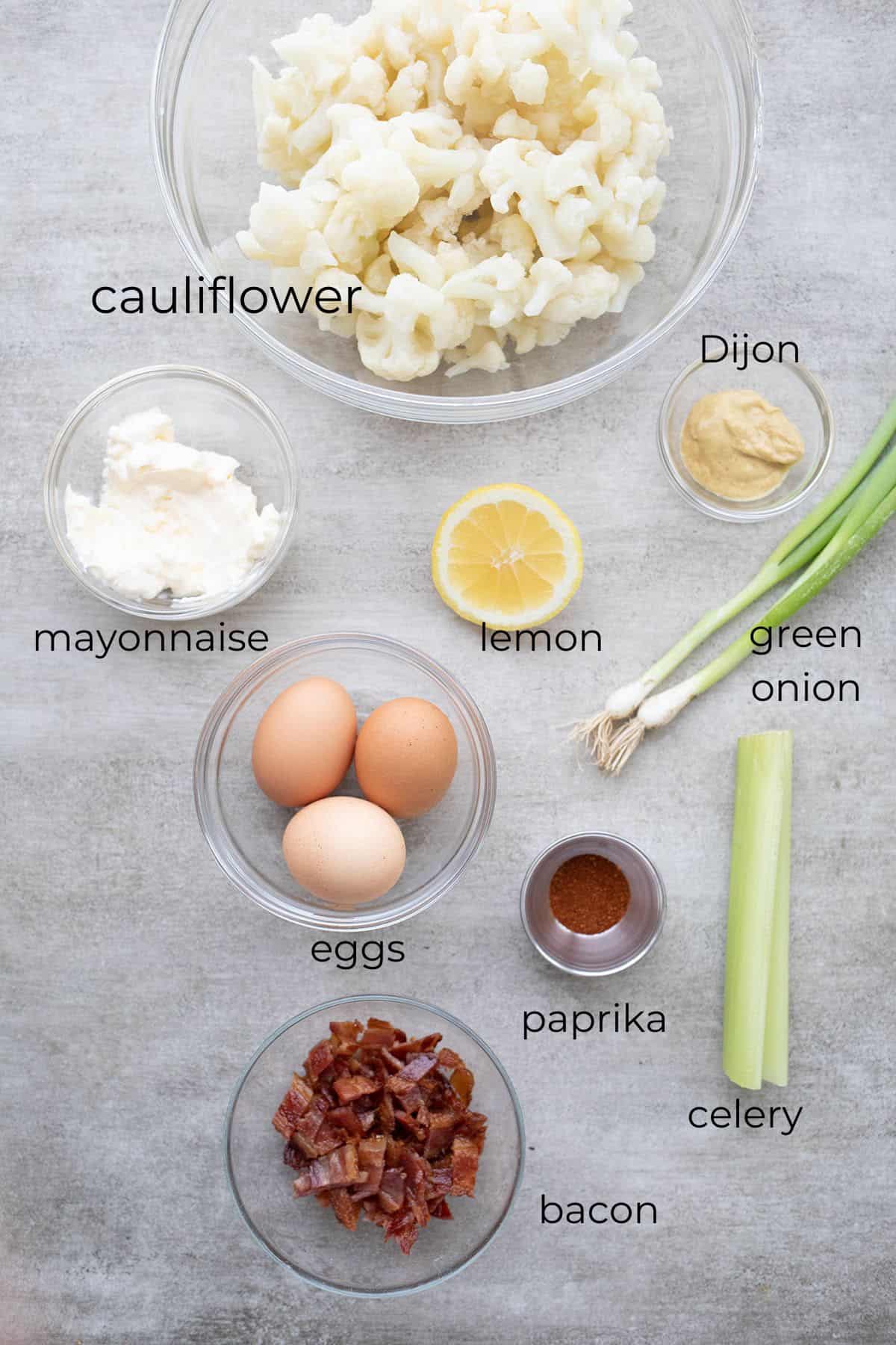 Top down image of ingredients needed for Cauliflower Potato Salad.