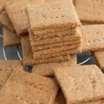 A small stack of sugar free graham crackers with more crackers around it
