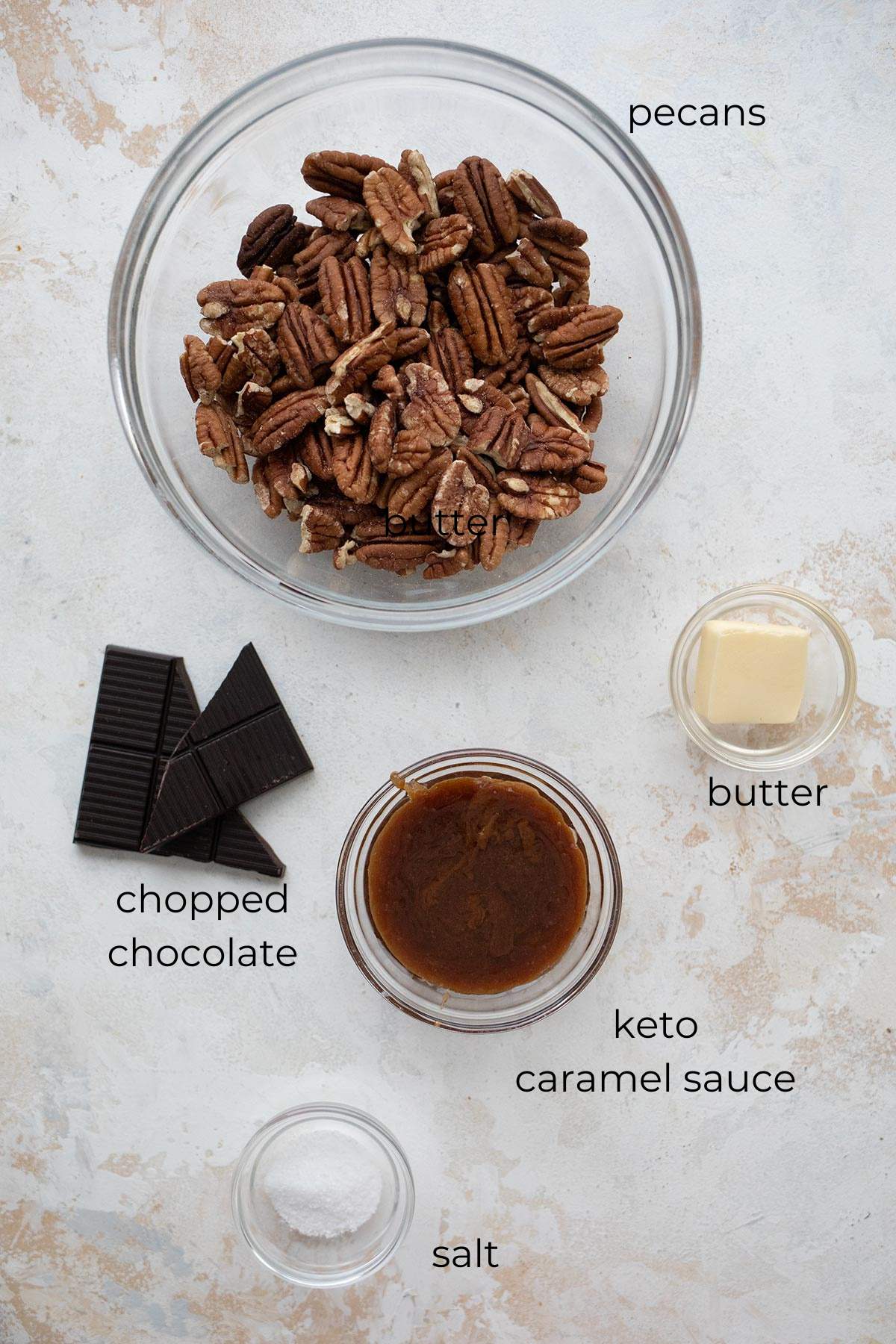 Top down image of the ingredients needed for Keto Turtles Candies.