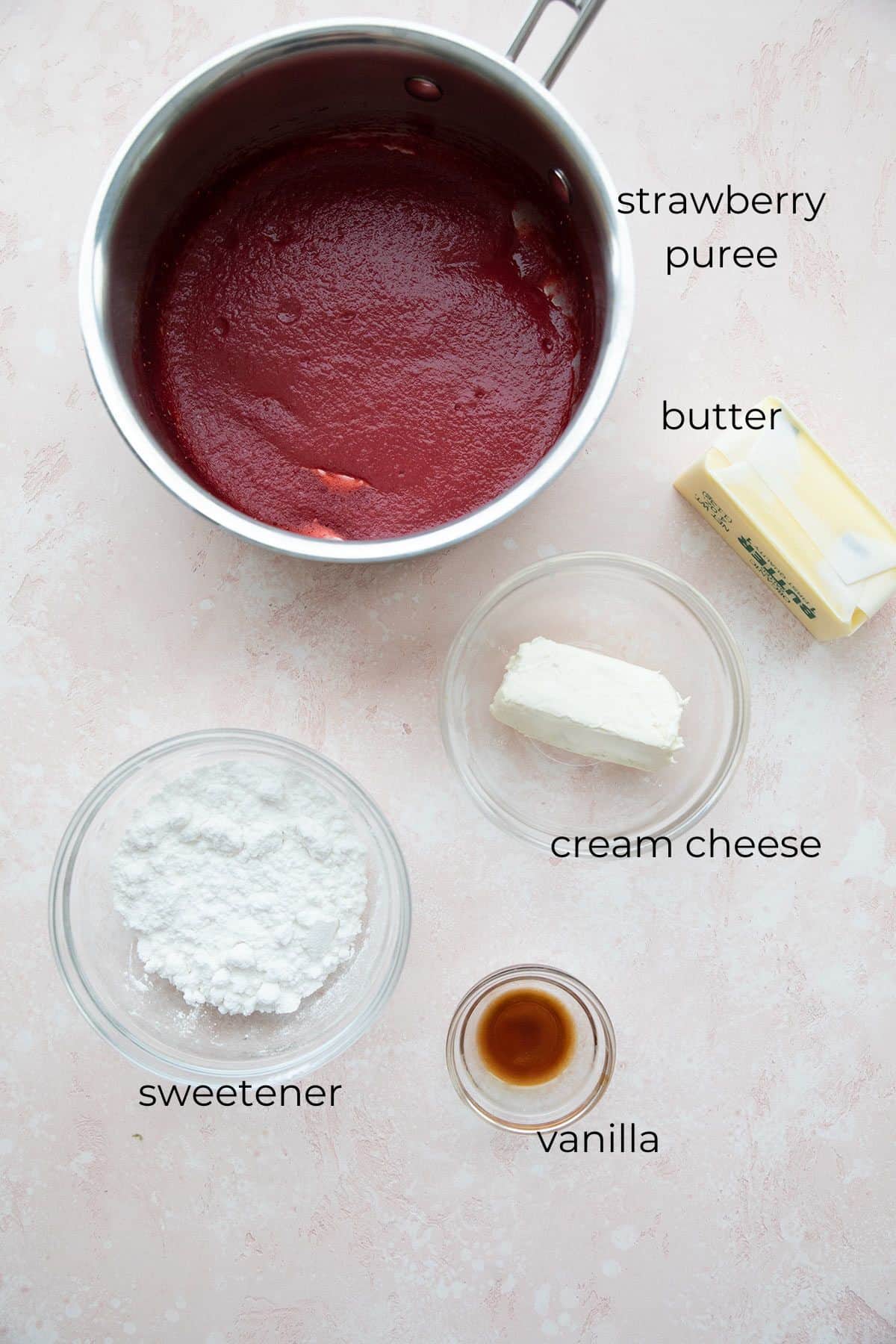 Top down image of ingredients needed for sugar-free strawberry frosting.