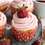 Titled Pinterest image of Keto Strawberry Cupcakes on a metal cake stand.