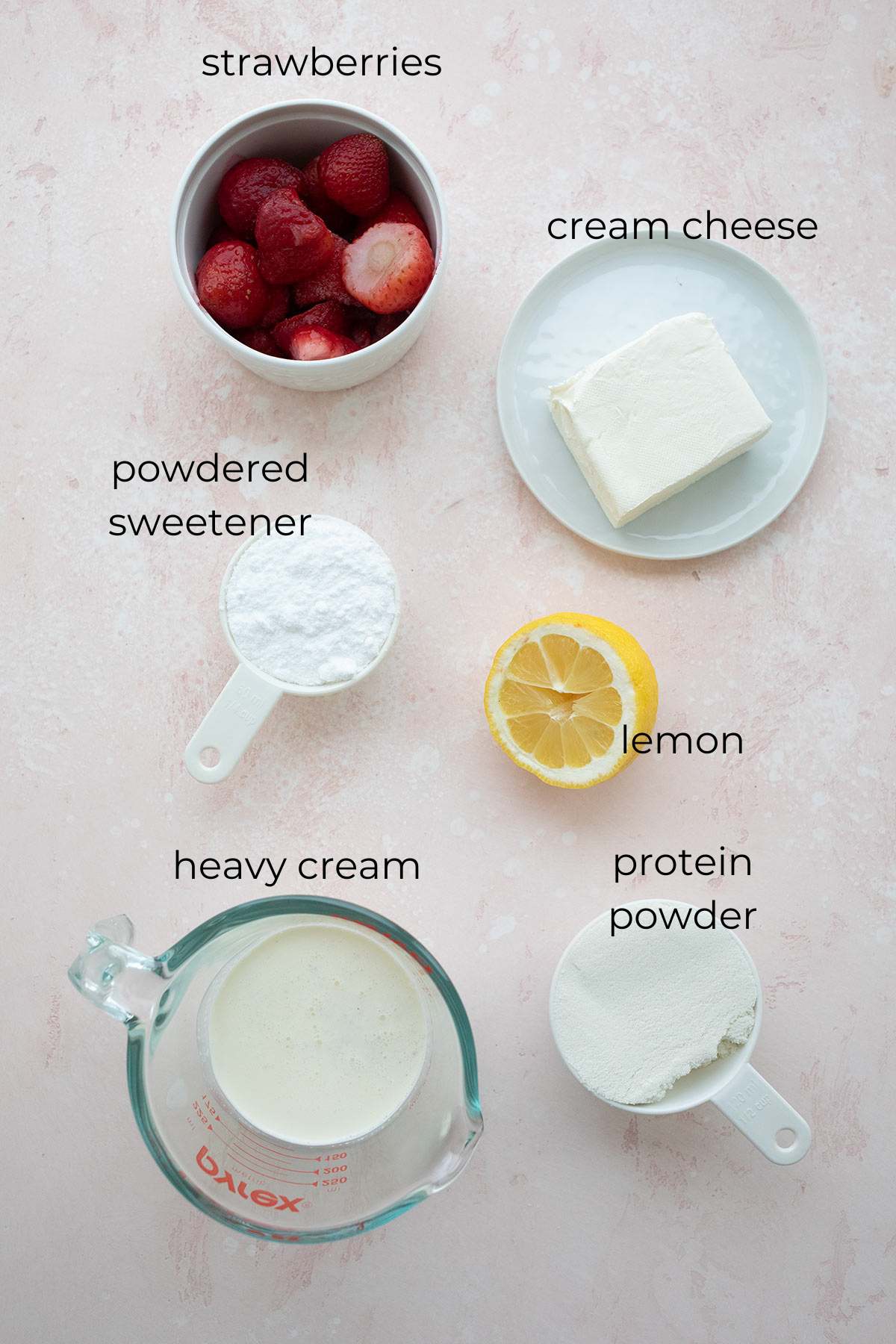 Top down image of ingredients needed for Strawberry Keto Popsicles.