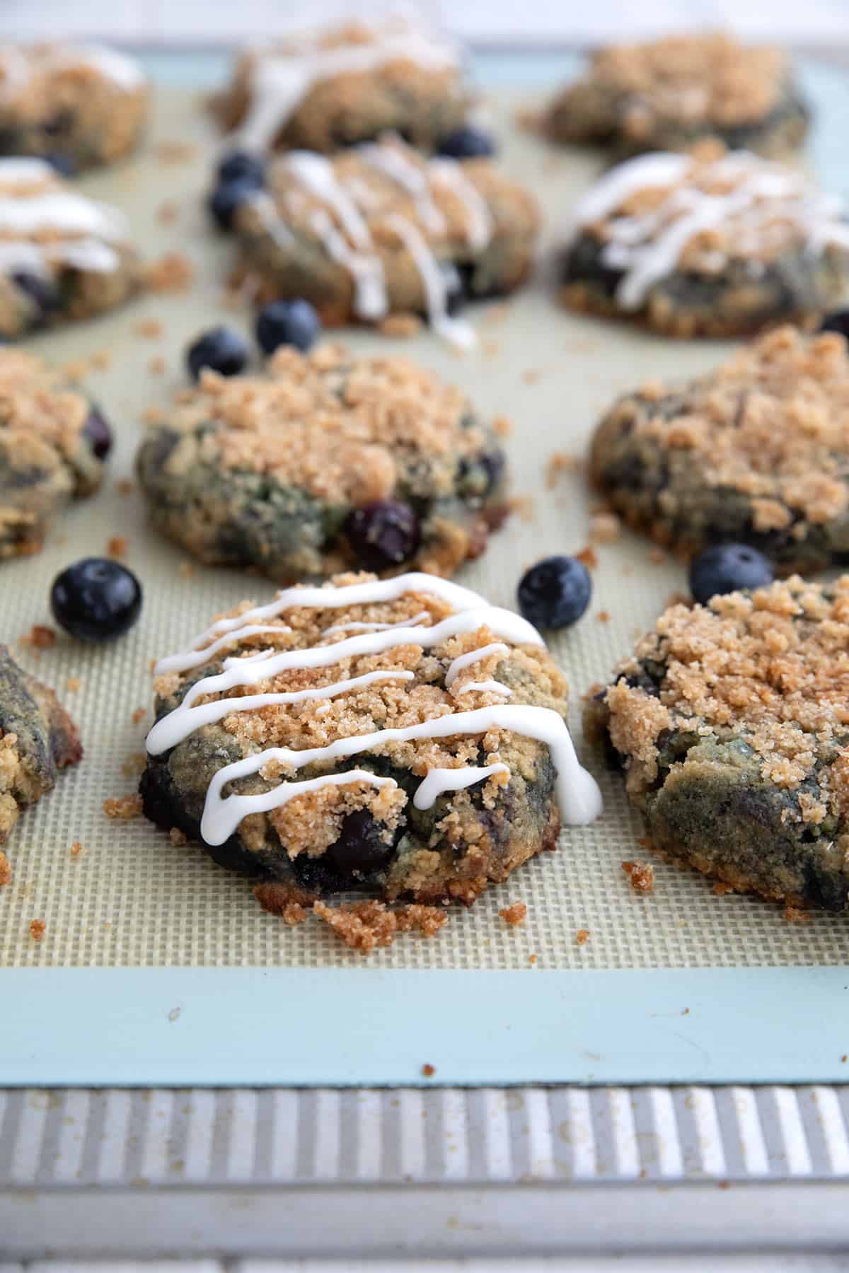 Keto Blueberry Muffin Cookies on the baking sheet after coming out of the oven.